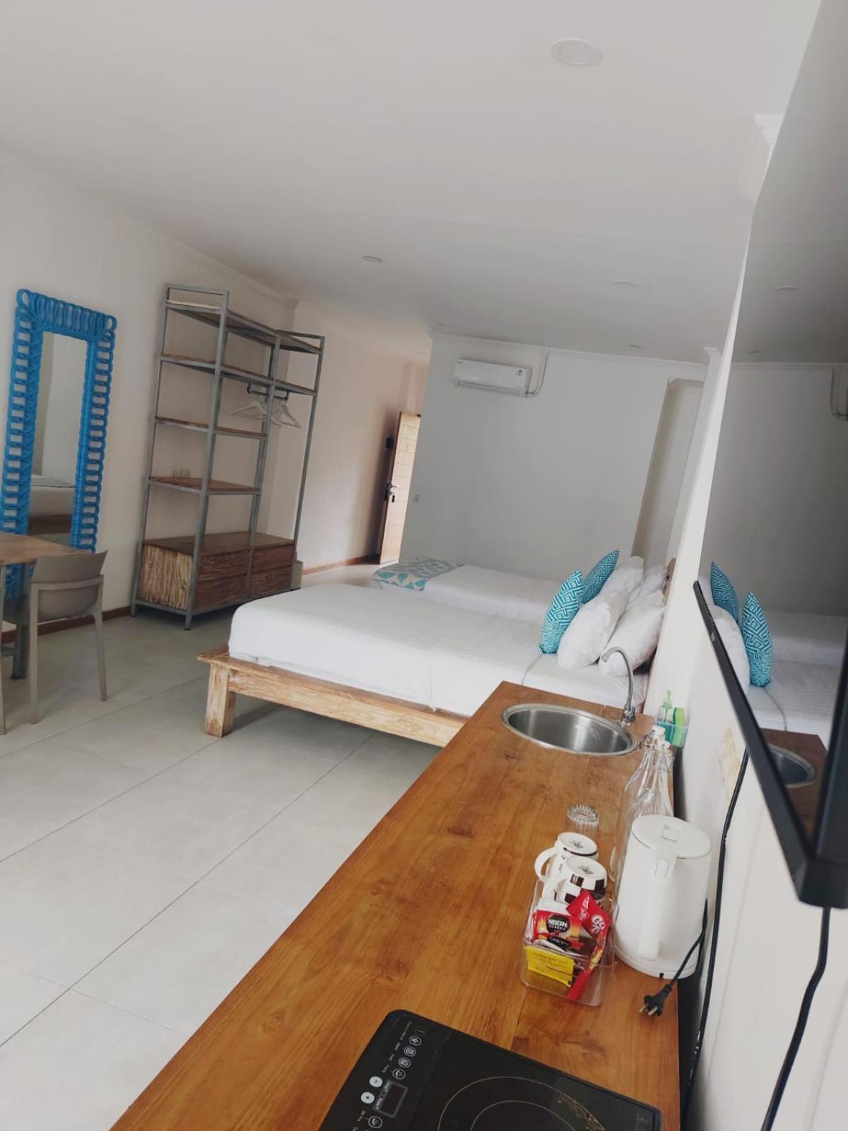 Triple 8 Suites ลาบวนบาโจ ภายนอก รูปภาพ